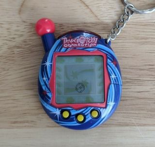 Tamagotchi Connection V4 Blue W/ Swirls & Red Bandai 2004